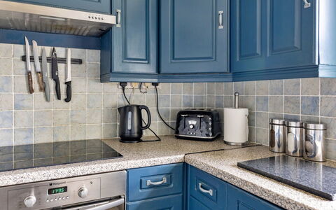 Ty Pen Y Bryn, Castle Views: Blue, Kitchen, Kitchen Appliance, Cabinetry, Countertop, Major Appliance, Flooring, Interior Design, Furniture, Drawer