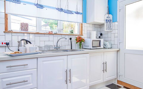 Morwen: Kitchen, Interior Design, Countertop, Cabinetry, Flooring, Kitchen Appliance, Furniture, Major Appliance, Lighting, Floor