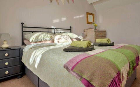 Penrhos Sea Cottage: Bed, Furniture, Bedding, Bedroom, Bed Sheet, Interior Design, Linens, Wood, Flooring, Textile