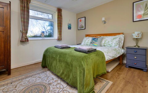 Penrhos Sea Cottage: Bed, Furniture, Bedroom, Bed Sheet, Interior Design, Bedding, Wood, Flooring, Linens, Bed Frame