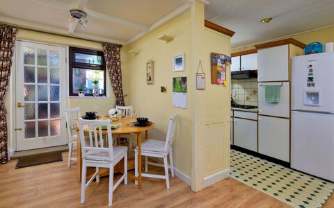 Delfryn: Furniture, Interior Design, Flooring, Major Appliance, Floor, Room, Ceiling, Countertop, Kitchen, Cabinetry