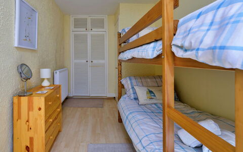 Delfryn: Furniture, Wood, Interior Design, Flooring, Floor, Bed, Room, Bedroom, Bed Sheet, Apartment