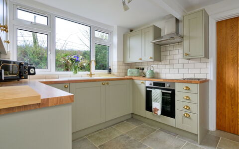 Merddyn Cottage: Kitchen, Flooring, Wood, Countertop, Interior Design, Cabinetry, Kitchen Appliance, Floor, Major Appliance, Ceiling