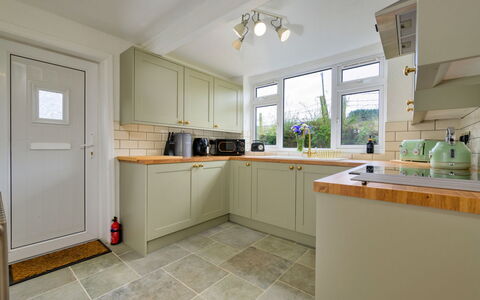 Merddyn Cottage: Flooring, Wood, Interior Design, Kitchen, Countertop, Ceiling, Floor, Cabinetry, Kitchen Appliance, Furniture