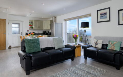 Hedd Wen Cottage: Furniture, Couch, Interior Design, Living Room, Flooring, Room, Home, Textile, Lighting, Floor