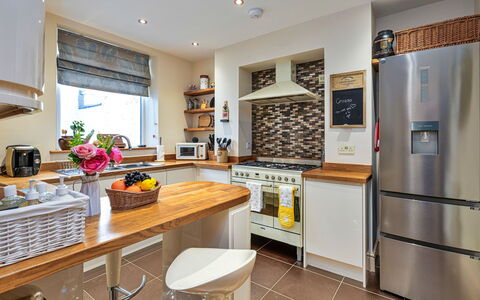 Bryn Derfel House: Kitchen, Furniture, Countertop, Kitchen Appliance, Cabinetry, Interior Design, Major Appliance, Flooring, Wood, Home Appliance