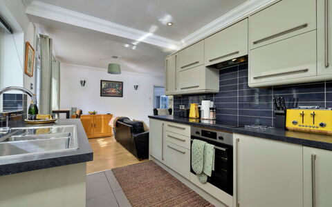 Dyffryn: Kitchen, Countertop, Kitchen Appliance, Major Appliance, Interior Design, Flooring, Ceiling, Cabinetry, Floor, Furniture