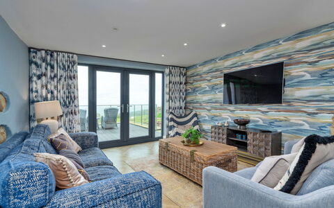 Goferydd: Furniture, Apartment, Coast, Resort, Living Room, Couch, Hotel