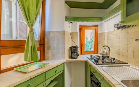 La Finestra sul Lago: Interior Design, Kitchen, Wood, Ceiling, Flooring, Countertop, Major Appliance, Room, Floor, Kitchen Appliance