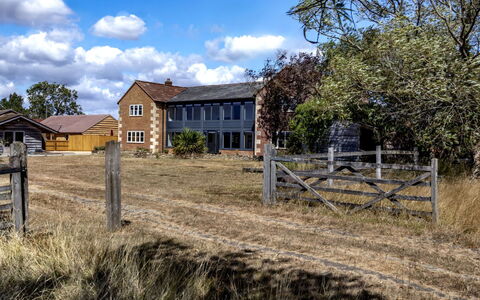 The Cottages Collection at Rusty Lane Farm: House, Home, Rural Area, Roof, Landscape, Plain, Grassland, Cottage, Land Lot, Human Settlement