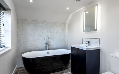 The Cottages Collection at Rusty Lane Farm: Wall, Plumbing Fixture, Bathtub, Flooring, Interior Design, Bathroom, Floor, Home, Lighting, Tap