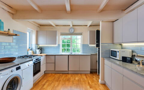 The Breakers: Kitchen, Flooring, Countertop, Interior Design, Wood, Major Appliance, Floor, Cabinetry, Kitchen Appliance, Ceiling