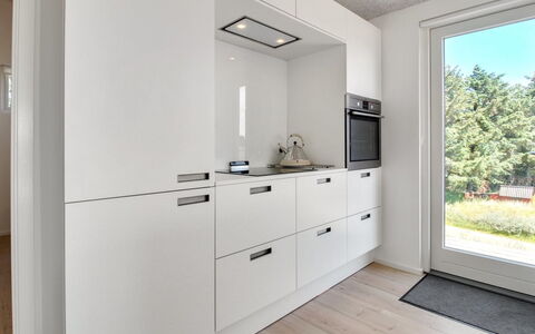 Fromer - 800M from the Sea: Kitchen, Countertop, Flooring, Cabinetry, Interior Design, Kitchen Appliance, Wood, Floor, Ceiling, Major Appliance