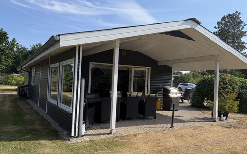 Alkmar - from the Sea: Roof, Door, Home, Cottage, Porch, Siding, Shade, Outdoor Structure, Garden Buildings, Yard