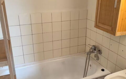 Elizabeth: Flooring, Wall, Floor, Interior Design, Plumbing Fixture, Bathtub, Plumbing, Room, Tile, Bathroom
