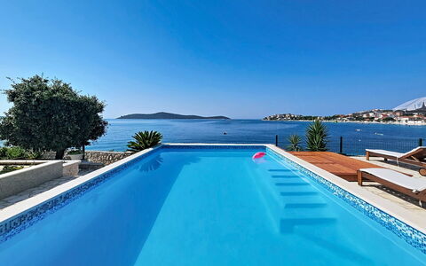 Bliss: Blue, Swimming Pool, Water, Resort, Sea, Coastal And Oceanic Landforms, Eco Hotel, Outdoor Furniture, Leisure, Coast