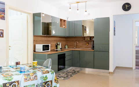Casa Dell'Ulivo: Furniture, Kitchen, Cabinetry, Countertop, Interior Design, Kitchen Appliance, Flooring, Major Appliance, Wood, Floor