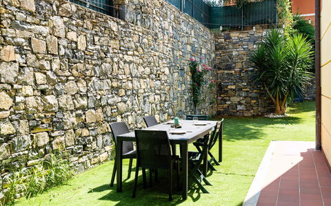 Casa Dell'Ulivo: Stone Wall, Shade, Garden, Outdoor Furniture, Backyard, Landscaping, Flagstone, Yard, Lawn, Eco Hotel