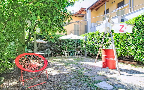 Verbania 695: Furniture, Chair, Outdoor Furniture, Garden, Backyard, Yard, Shade, Outdoor Table, Lawn, Landscaping