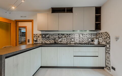 Federica: Kitchen, Countertop, Interior Design, Flooring, Wood, Kitchen Appliance, Cabinetry, Floor, Architecture, Major Appliance