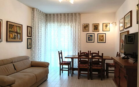 Oasi Blocco a: Furniture, Interior Design, Flooring, Floor, Couch, Wood, Room, Living Room, Ceiling, Table