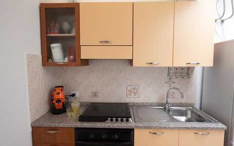 Sole Mare Sicilia: Kitchen Appliance, Kitchen, Countertop, Major Appliance, Cabinetry, Wood, Kitchen Sink, Stove, Kitchen Stove, Furniture