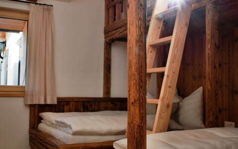 Kaiserchalet: Wood, Interior Design, Furniture, Bed, Ceiling, Floor, Bedroom, Room, Wood Stain, Hardwood
