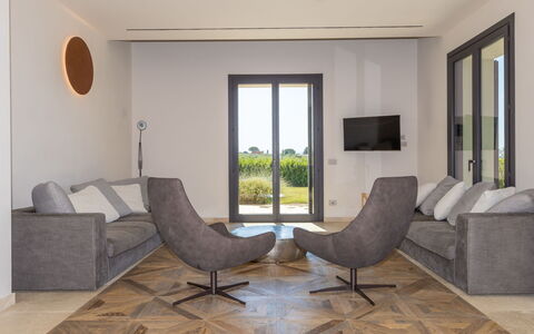 San Giuseppe: Furniture, Flooring, Interior Design, Floor, Wood, Living Room, Couch, Wood Flooring, Home, Lighting