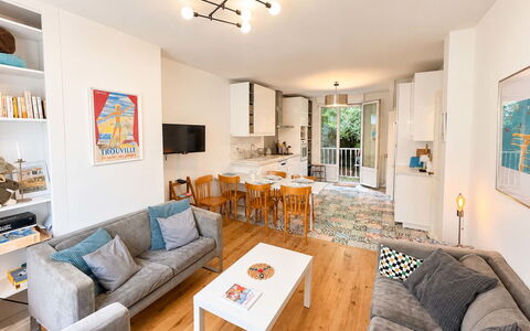 Petite Normandie: Furniture, Interior Design, Flooring, Floor, Couch, Living Room, Table, Room, Ceiling, Apartment