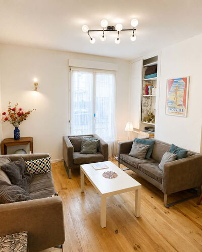 Petite Normandie: Furniture, Interior Design, Flooring, Couch, Floor, Wood, Room, Table, Living Room, Wood Flooring
