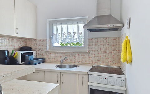 Marija: Kitchen, Countertop, Kitchen Appliance, Major Appliance, Cabinetry, Interior Design, Flooring, Furniture, Kitchen Sink, Floor