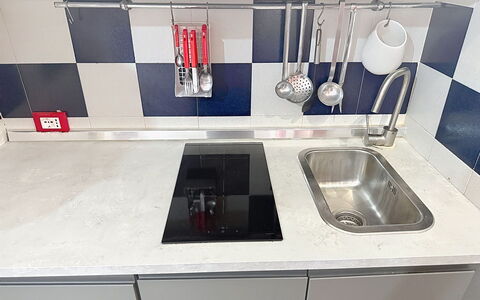 Habitat: Kitchen, Countertop, Kitchen Appliance, Kitchen Sink, Major Appliance, Sink, Plumbing Fixture, Tap, Kitchen Stove, Stove