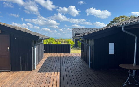 Thrine - 150M from the Sea: Sky, Wood, Roof, Composite Material, Siding, Plank, Cottage, Shade, Hardwood, Deck