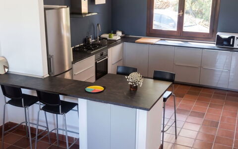Villa Ulivi: Flooring, Furniture, Interior Design, Kitchen, Countertop, Floor, Wood, Kitchen Appliance, Cabinetry, Lighting