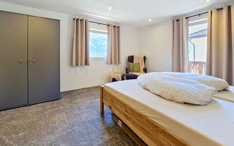 Alpenchalet Gundolf: Furniture, Bed, Interior Design, Bedroom, Flooring, Floor, Wood, Ceiling, Bed Sheet, Room