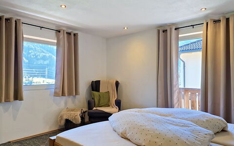 Alpenchalet Gundolf: Bed, Furniture, Interior Design, Bedroom, Bedding, Bed Sheet, Wood, Floor, Ceiling, Flooring