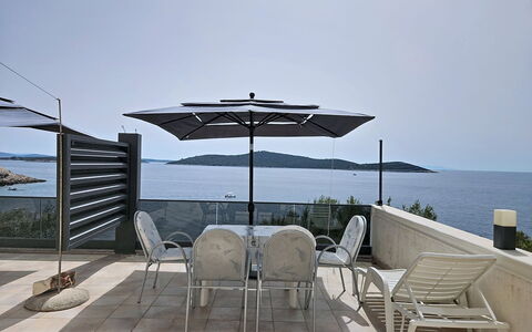 Marina Sevid 106: Furniture, Outdoor Furniture, Chair, Table, Umbrella, Outdoor Table, Sea, Shade, Swimming Pool, Coastal And Oceanic Landforms