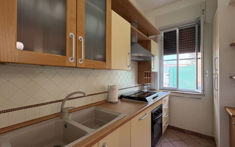 Villa Sandra: Kitchen, Countertop, Kitchen Appliance, Major Appliance, Kitchen Sink, Cabinetry, Wood, Flooring, Interior Design, Plumbing Fixture