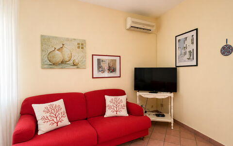 Villa Sandra: Furniture, Interior Design, Flooring, Couch, Floor, Room, Picture Frame, Living Room, Table, Lighting