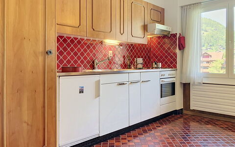 Grand-Pré B: Kitchen, Countertop, Flooring, Wood, Interior Design, Kitchen Appliance, Cabinetry, Major Appliance, Floor, Tile