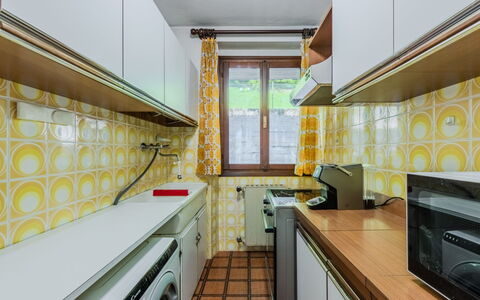 Nido del Brenta: Major Appliance, Flooring, Interior Design, Yellow, Kitchen, Floor, Ceiling, Kitchen Appliance, Countertop, Lighting