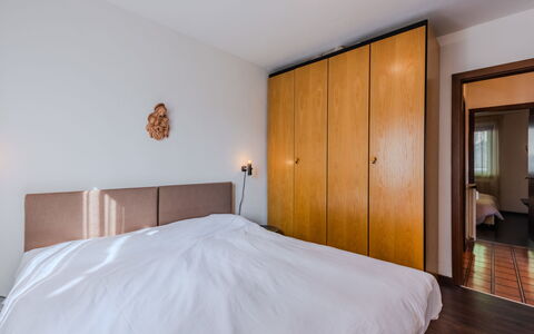 Nido del Brenta: Interior Design, Bed, Furniture, Flooring, Bedroom, Wood, Floor, Ceiling, Room, Lighting
