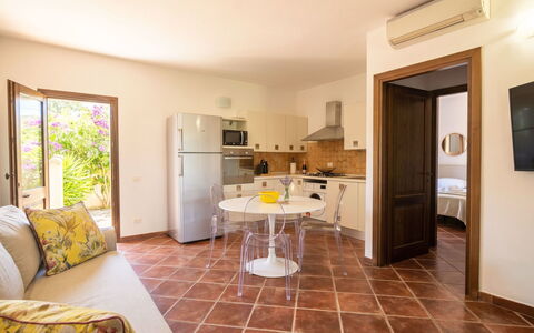 Casa Dell'Ulivo: Vegetation, Shrub, Spring, Cottage, Garden, Shade, Backyard, Yard, Chair