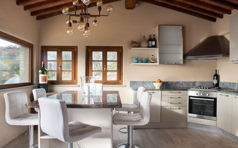 Villa Casabada: Furniture, Interior Design, Kitchen, Countertop, Flooring, Light Fixture, Wood, Cabinetry, Ceiling, Home