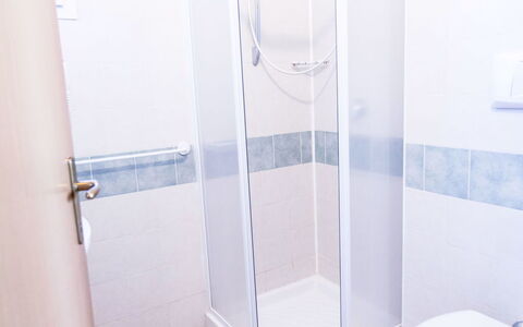 Peschiera del Garda 689: Floor, Flooring, Plumbing Fixture, Interior Design, Room, Plumbing, Bathroom, Shower, Shower Door, Door