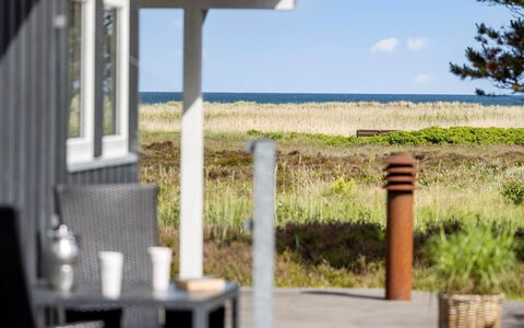 Chris - 130M from the Sea: Sky, Land Lot, Cottage, Shade, Outdoor Furniture, Porch, Hardwood, Outdoor Structure, Outdoor Table, Siding