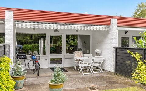 Maureen - 150M from the Sea: Shrub, Home, Door, Garden, Brick, Groundcover, Cottage, Estate, Siding, Flowerpot