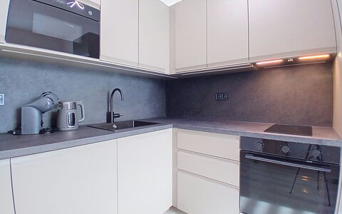 Buky Escape: Kitchen, Countertop, Cabinetry, Kitchen Appliance, Wood, Interior Design, Flooring, Major Appliance, Plumbing Fixture, Home Appliance