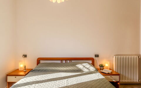 Barella: Bed, Interior Design, Bedroom, Furniture, Wall, Bed Sheet, Bedding, Flooring, Wood, Floor