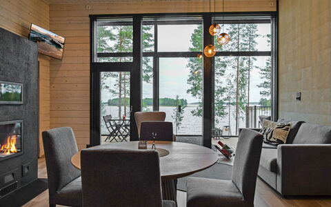 Jäkälänkallion Ranta: Roof, Home, Siding, Cottage, Yard, Hardwood, Design, Garden Buildings, Wood Stain, Farmhouse